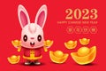 Cartoon cute rabbit holding gold ingots and gold ingots spread on ground chinese new year 2023 greeting card