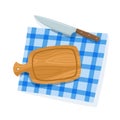 Cartoon cutting board, knife on blue napkin isolated on white