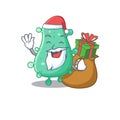 Cartoon design of agrobacterium tumefaciens Santa with Christmas gift