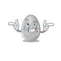 Cartoon design of egg kitchen timer showing funny face with wink eye Royalty Free Stock Photo