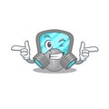 Cartoon design of respirator mask showing funny face with wink eye