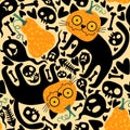 Cartoon doodle Halloween seamless cats and pumpkins and skulls and bones pattern for wrapping paper