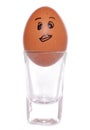 Cartoon egg in shot glass egg cup Royalty Free Stock Photo