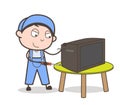 Cartoon Electrician Repairing a Television Vector Illustration