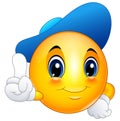 Cartoon emoticon smiley wearing a cap and pointing