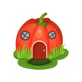 Cartoon fantasy house in shape of red pumpkin with round windows and wooden door. Magic world. Fairy-tale architecture Royalty Free Stock Photo
