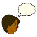 cartoon female face with narrowed eyes with thought bubble