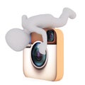 Cartoon Figure Climbing on Instagram Camera Icon