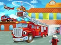 Cartoon firetruck driving out of fire station to action with other different fireman vehicles Royalty Free Stock Photo