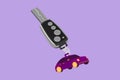 Cartoon flat style drawing key car and key ring over the metallic table. Clipping path included. Electronic car key front and back