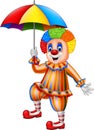 Cartoon funny clown holding an umbrella