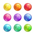 Cartoon glossy colorful round buttons. Royalty Free Stock Photo