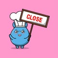 cartoon goblin monster chef holding close sign