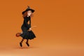 Cartoon Halloween witch flying on broom on yellow background. 3d render