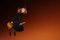 Cartoon Halloween witch flying on broom on yellow background. 3d render