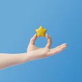 Cartoon hand holding star on a blue background Royalty Free Stock Photo