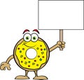 Cartoon happy donut holding a sign.