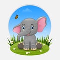 Cartoon happy elephant sitting on the grass Royalty Free Stock Photo