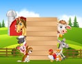 Cartoon happy farm animals holding wooden sign