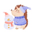 Cartoon Hedgehog Character Wearing Warm Clothes Making Snowman Vector Illustration