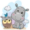 Cartoon Hippo and owl on the meaow Royalty Free Stock Photo