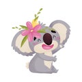 Cartoon humanized cute koala with a flower. Vector illustration on white background. Royalty Free Stock Photo