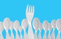 Fork ruling among spoon group or crowd Royalty Free Stock Photo