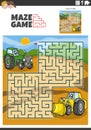 maze game with cartoon tractor and bulldozer characters Royalty Free Stock Photo