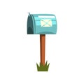 Cartoon illustration of metallic mailbox on wooden pole. Icon of blue closed postbox standing on piece of green grass