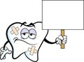 Cartoon sad tooth with bandages holding a sign. Royalty Free Stock Photo