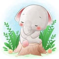 Cute elephant sitting on tree stump with green plants Royalty Free Stock Photo