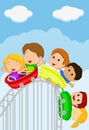 Cartoon kids riding roller coaster Royalty Free Stock Photo