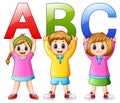 Cartoon kids showing alphabets