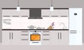 Cartoon kitchen interior with fridge, oven and cooking appliances