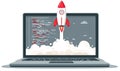 Software Launch: Rocket Taking Off from Laptop Screen Royalty Free Stock Photo