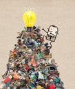 Cartoon Man Climbing up a big Pile of Garbage Happy to see a light Royalty Free Stock Photo