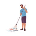 Bearded man with rake gathering garbage litter