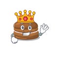 A cartoon mascot design of chocolate macaron performed as a King on the stage