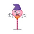 Cartoon mascot of funny candy heart lollipop dressed as an Elf