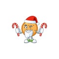 Cartoon mascot style of peanut butter cookies in Santa costume with candy Royalty Free Stock Photo