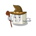 Cartoon mascot style of sugar cube dressed as a witch