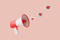 Cartoon megaphone heart sign on notification speech bubble on pink background Royalty Free Stock Photo