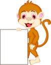 Cartoon monkey holding blank sign Royalty Free Stock Photo