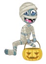 Cartoon mummy character hold the halloween pumpkin