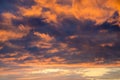 Cartoon orange and purple cumulus clouds. Close-up