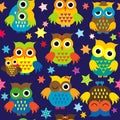 Cartoon owls in the nighttime colorful seamless pattern