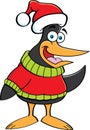 Cartoon penguin wearing a sweater and a Santa hat.