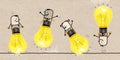Cartoon People playing and bumping wit big Light bulbs Royalty Free Stock Photo