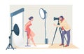 Cartoon photographers shooting model. Man taking pictures with professional camera and light equipment. Woman posing in Royalty Free Stock Photo