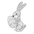 Cartoon rabbit with egg